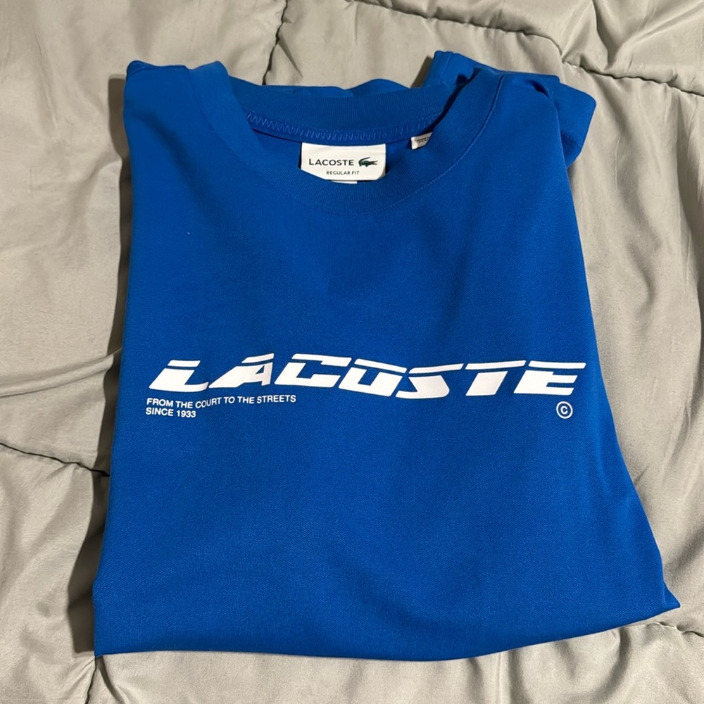 Blue Lacoste shirt